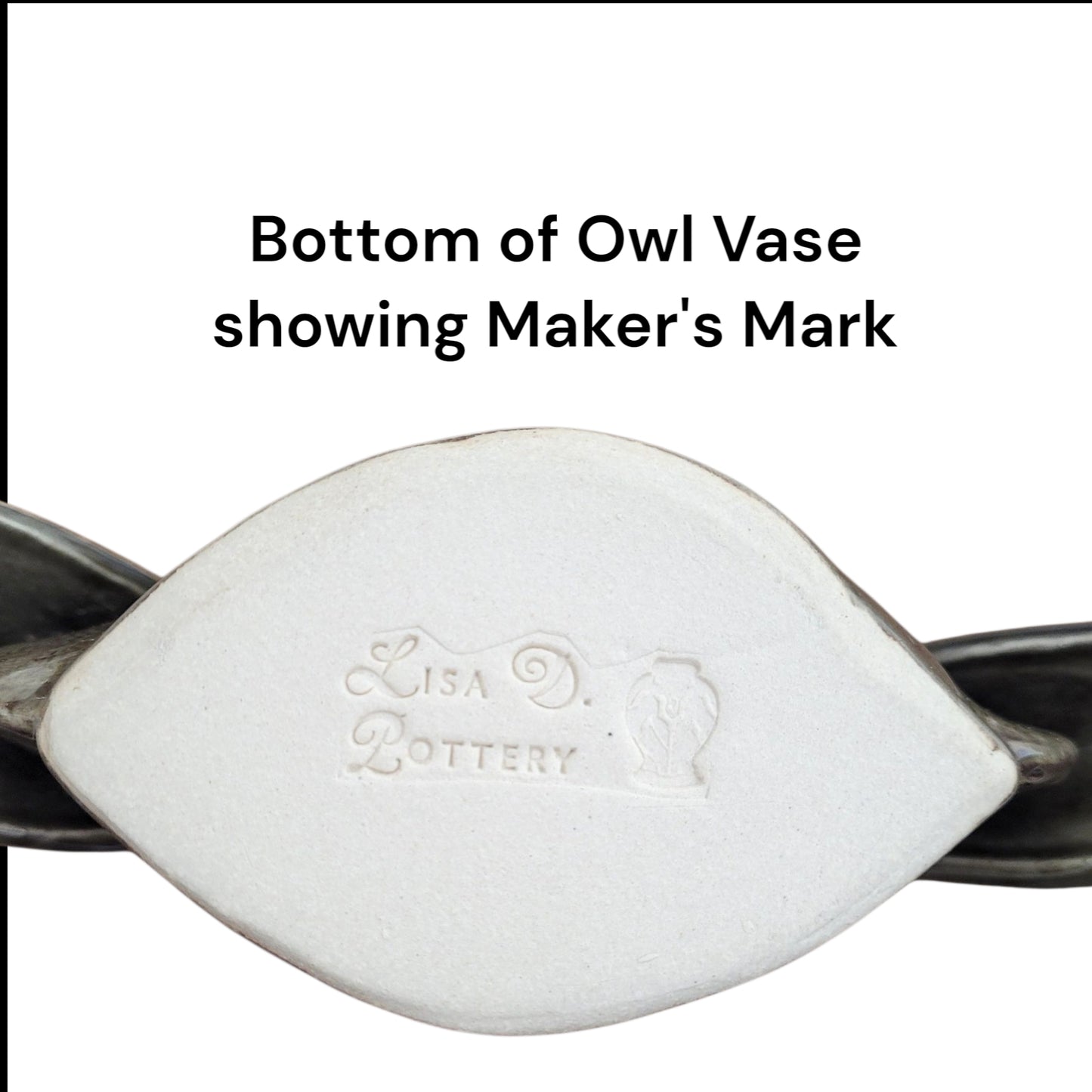 Bottom of an owl vase showing 'Lisa Pottery' maker's mark on a white background.