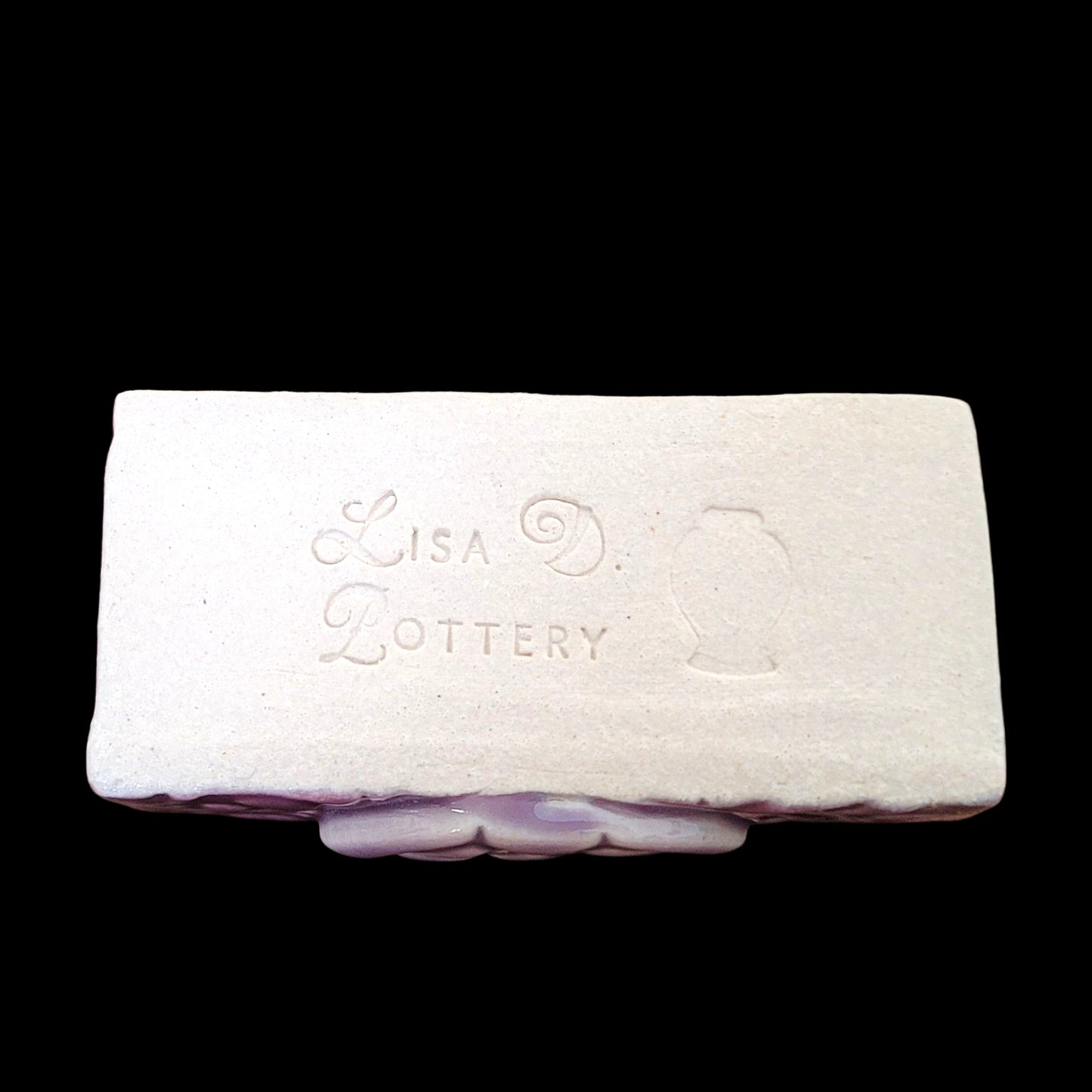 Bottom of business card holder with Lisa D Pottery "Maker's Mark"