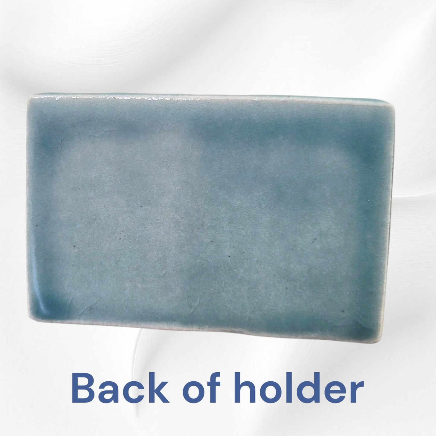 Rectangular blue business card holder on a white background with text 'Back of holder'.