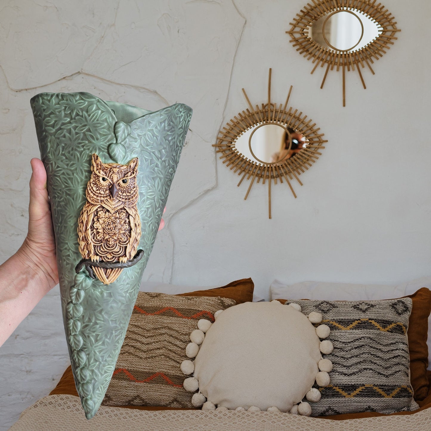 Front view of handcrafted owl wall pocket vase showing whimsical design and glazed finish