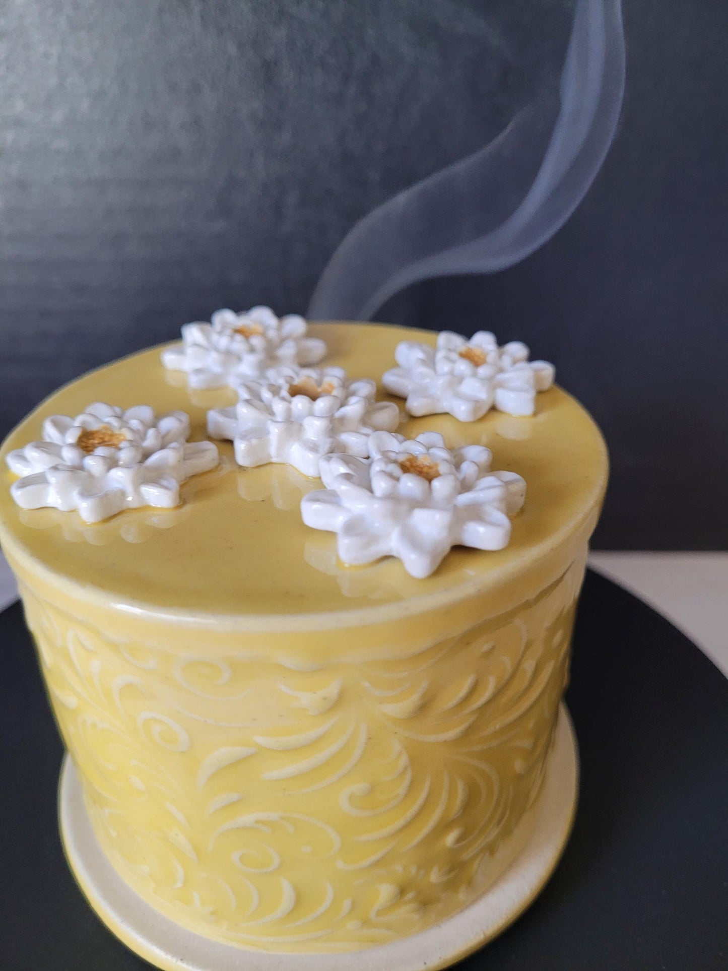 White lotus incense cone holder made from kiln-fired stoneware clay for aromatherapy