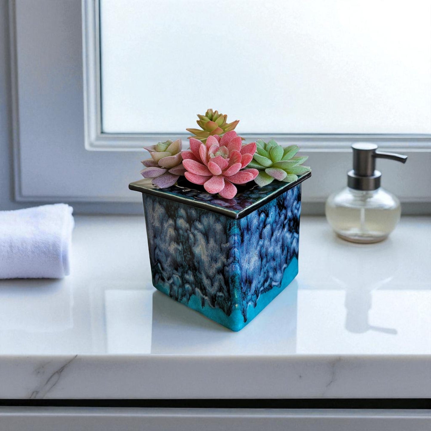 Decorative succulent planter on a bathroom counter