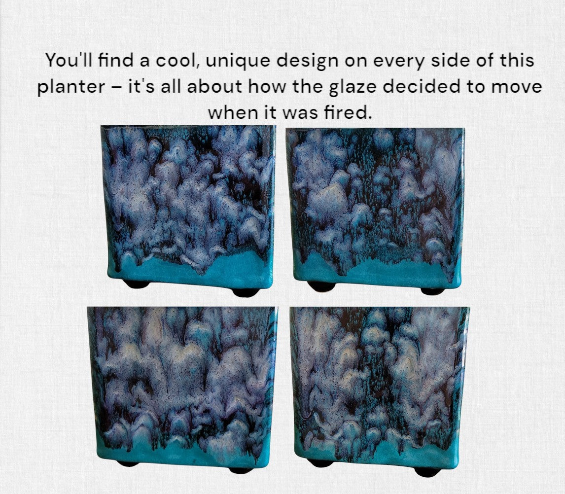 Four sides of a blue and dark gray ceramic planter with unique glaze patterns on a white background.