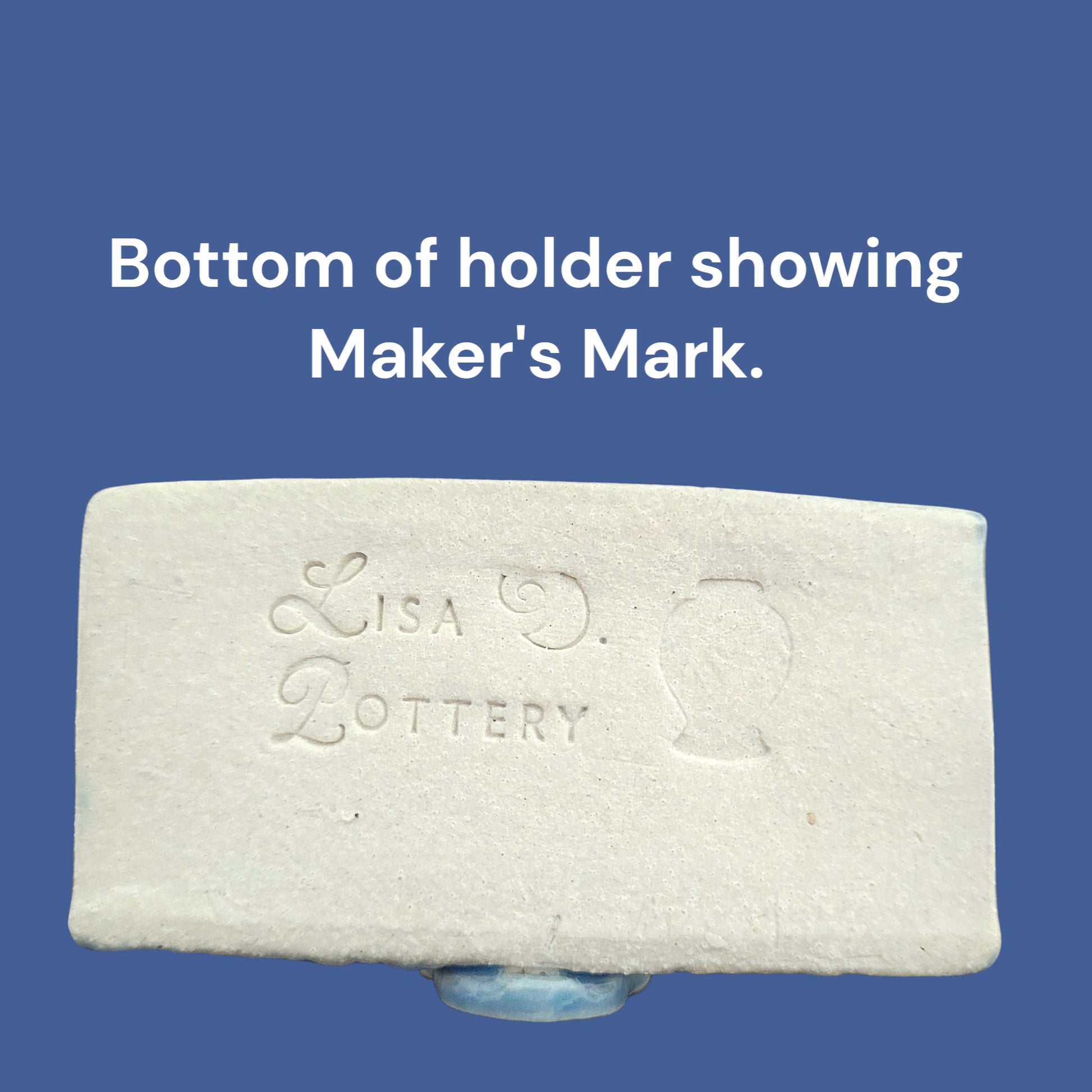 Bottom of ceramic business card holder with 'Lisa Pottery' branding on a blue background