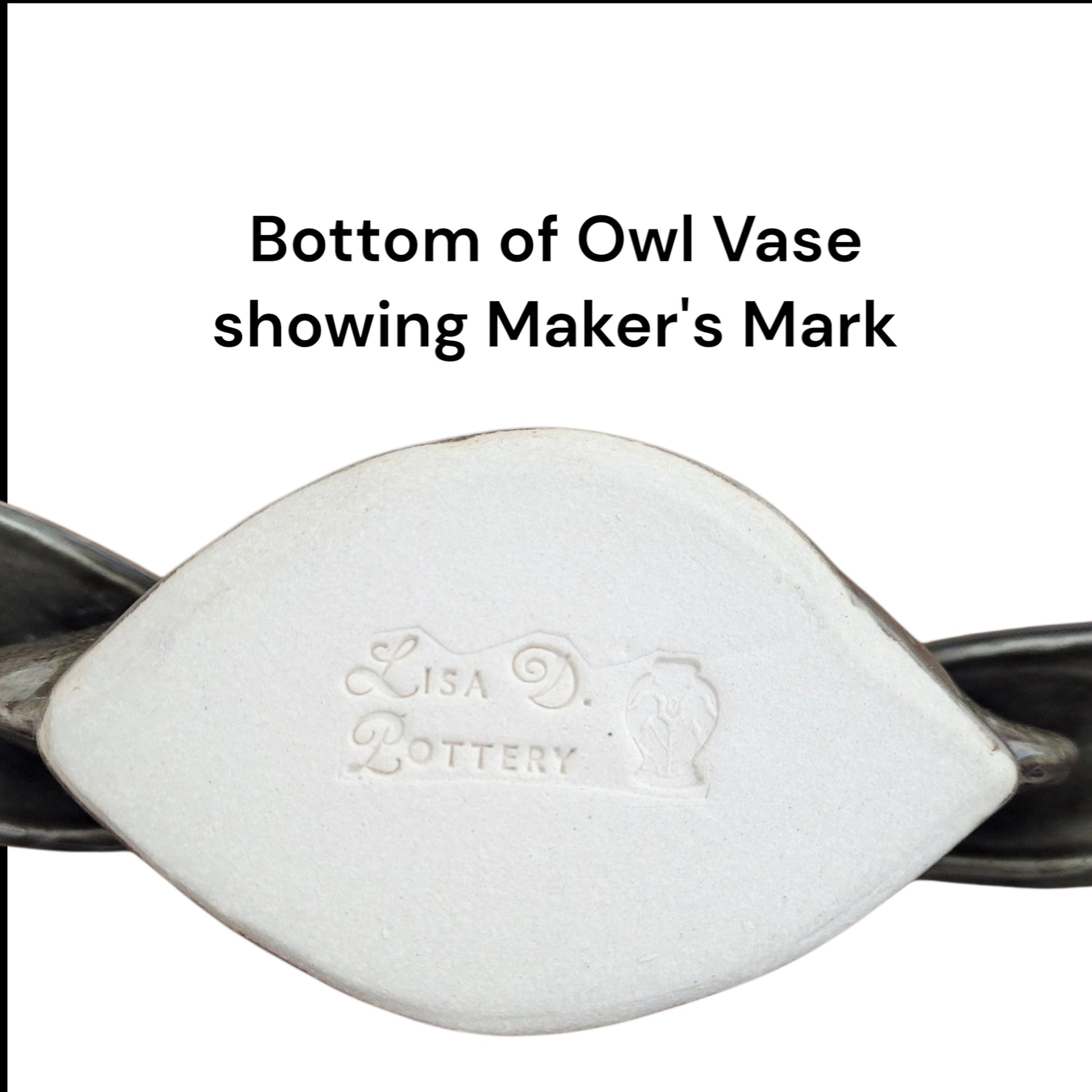 Bottom of an owl vase showing 'Lisa Pottery' maker's mark on a white background.