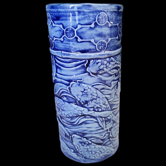 Close-up view of blue koi vase showing detailed hand-glazed finish and artisan craftsmanship
